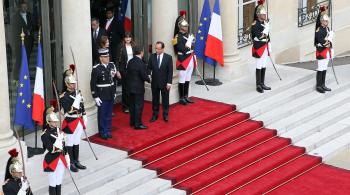 PARIS : Traditional protocol-laden handover of power, Nicolas Sarkozy-Francois Hollande..
