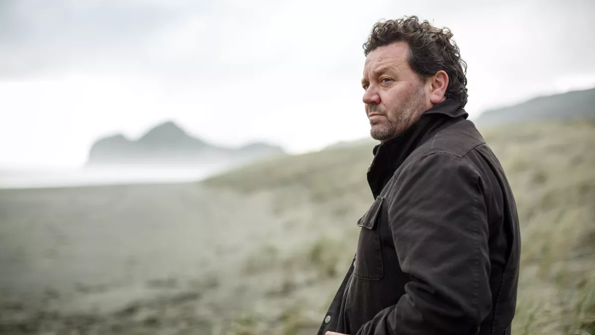 Neil Rea sur une plage 