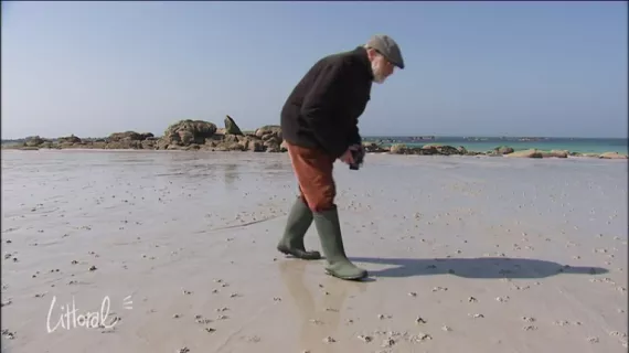 en bottes sur la plage